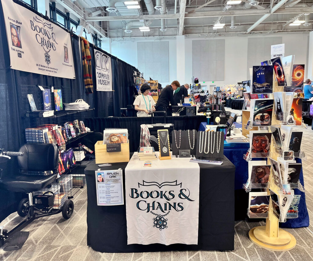 The side view of the Books & Chains booth.