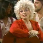 Screenshot of Dolly Parton in her video for the song 9 to 5.